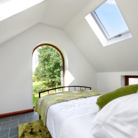 Admire the views from the unique bedroom window