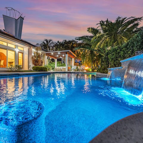 Unwind in the heated pool after dark