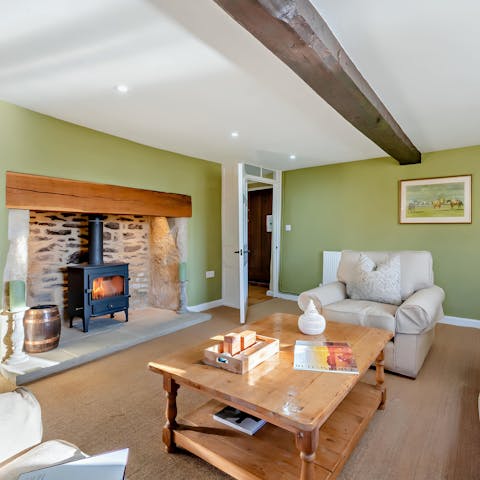Cosy up with a book in front of the wood-burning stove