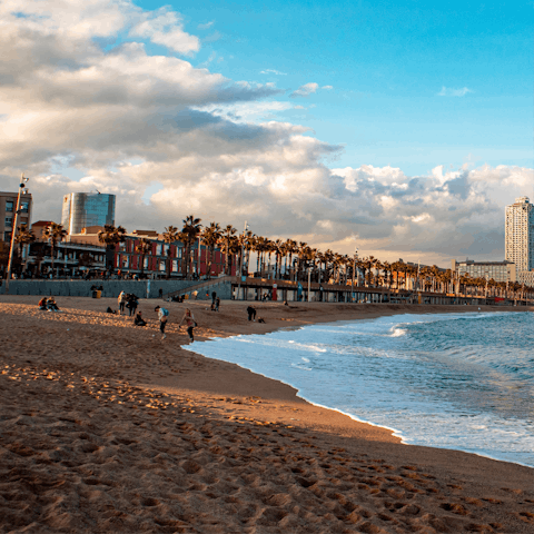 Sink your feet into the sand at Nova Mar Bella beach, a short walk away