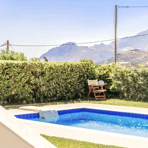 Admire views of the Sitia Mountains from the private pool