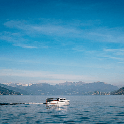 Head down to Lake Como and hire a boat to explore the sweeping sights
