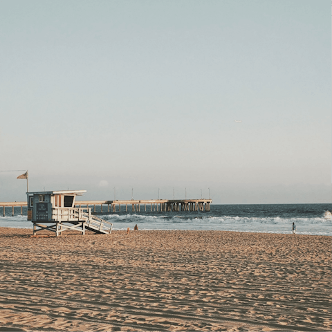 Head to the sandy shores of Venice Beach, a five-minute drive away