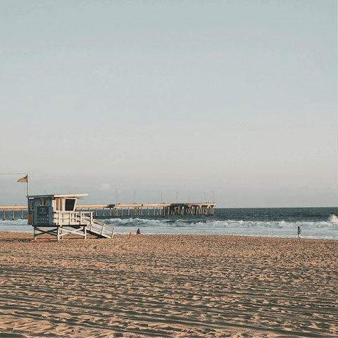 Head to the sandy shores of Venice Beach, a five-minute drive away