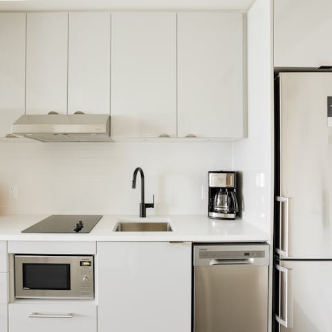 Rustle up a light bite to eat in your sleek kitchenette