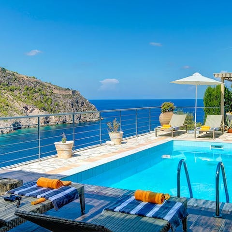 Soak up the sun and the Ionian Sea views by the private pool