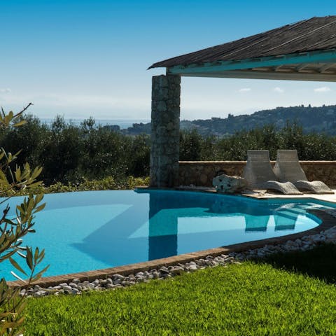 Feel refreshed and revived after a swim in the private outdoor pool