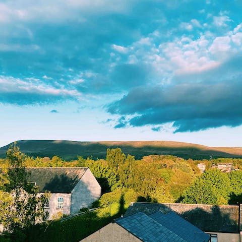 Wake up to stunning views of Pendle Hill from the master bedroom