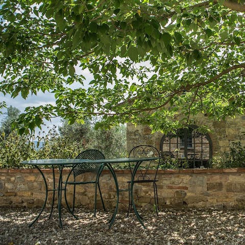 Enjoy alfresco meals under the olive trees