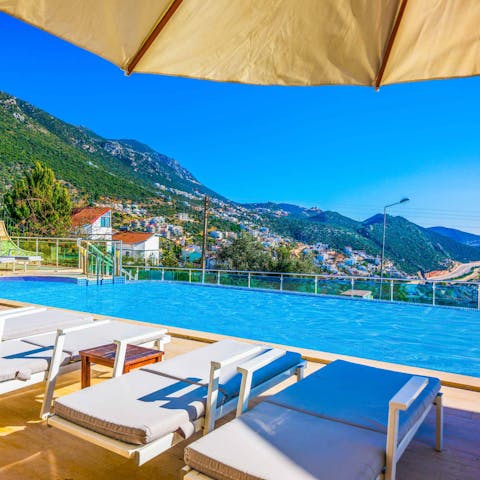 Lounge by the poolside at the foot of the Taurus Mountains