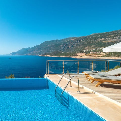 Drink up the dazzling sea vistas from your private infinity pool