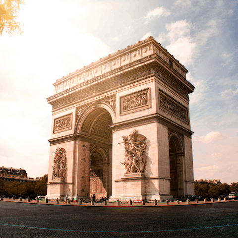 Marvel at the Arc de Triomphe, a ten-minute stroll away