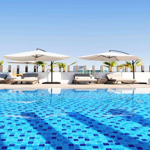 Catch some rays in the shimmering communal pool