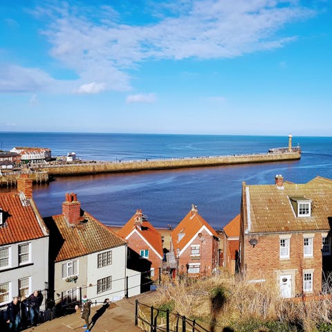 Walk five minutes to Whitby's West Cliff Beach and spend the day by the sea