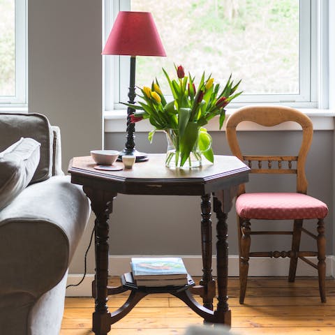 Settle down for a cup of well-earned tea in the pretty living room