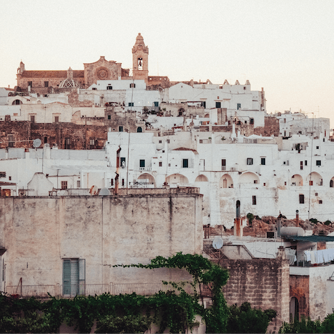 Explore the narrow streets of the White City – Ostuni is a short drive away