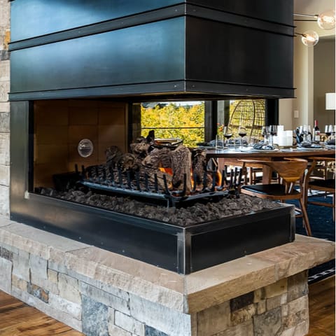 Warm cold hands at the fireplace