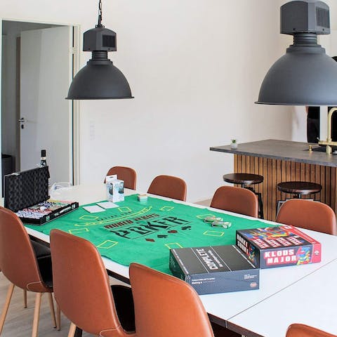 Come together around the dining table to play the board games on offer here
