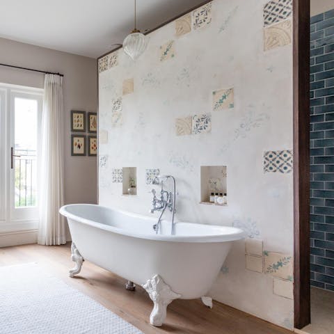 Relax and unwind with a soak in the clawfoot bathtub in the ensuite master bathroom