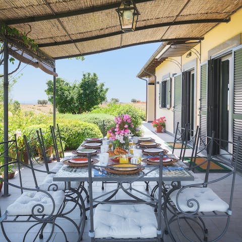 Gather on the covered terrace for alfresco feasts