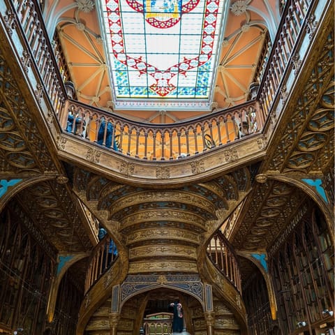 Admire the ornate Livraria Lello, within walking distance of the apartment