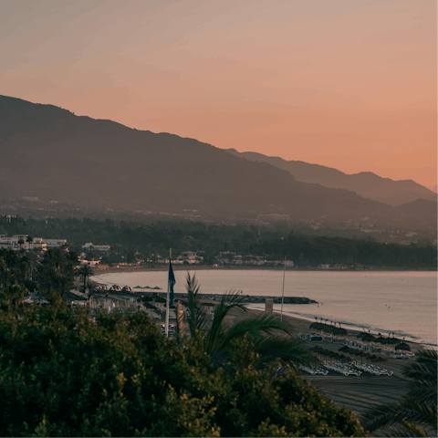 Stroll over to the nearby beach and enjoy drinks while watching the sunset