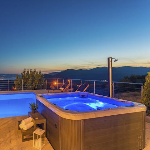 Watch the sunset from the outdoor Jacuzzi