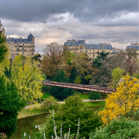 Stroll to the end of the street and reach the pretty Parc Des Buttes-Chaumont