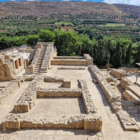 Explore the ruins of Knossos Palace – it's a twenty-minute drive
