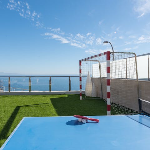 Play spot of ping pong or football on the terrace, or jump about on the trampoline