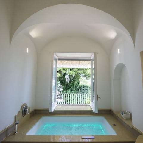 End the day with a soak in the main bedroom's tub