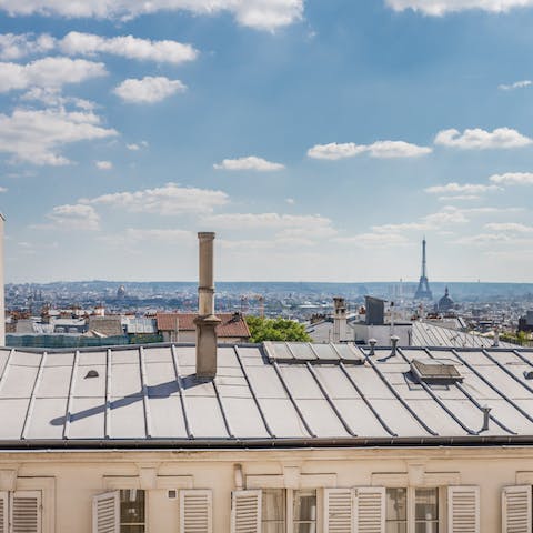 Take in that incredible view across the rooftops to the Eiffel Tower
