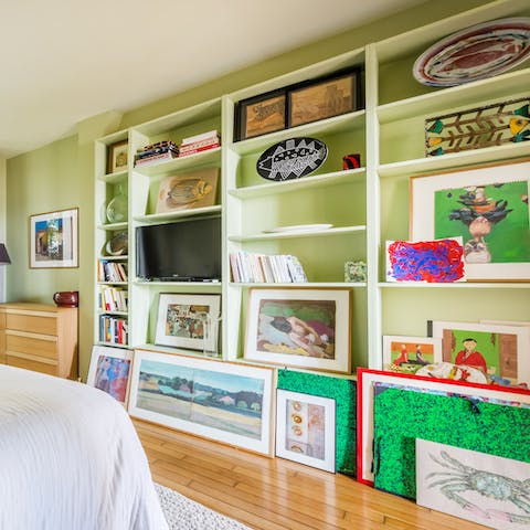 Admire the artistic homeowner's many pieces