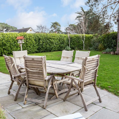 Sit on the sunny patio and enjoy the peace of a private garden