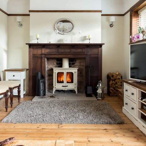 Get the wood-burner crackling in the living room for a cosy evening