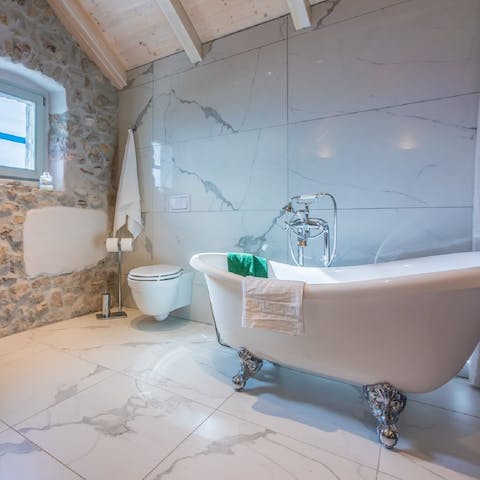 Take a long, relaxing soak in the freestanding bathtub
