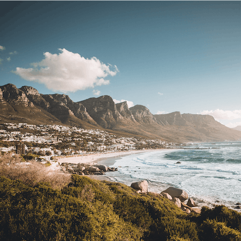 Take a ten-minute drive to Camps Bay for a day on the beach