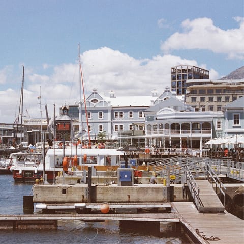 Stroll to the V&A Waterfront for shopping and Cape Town cuisine