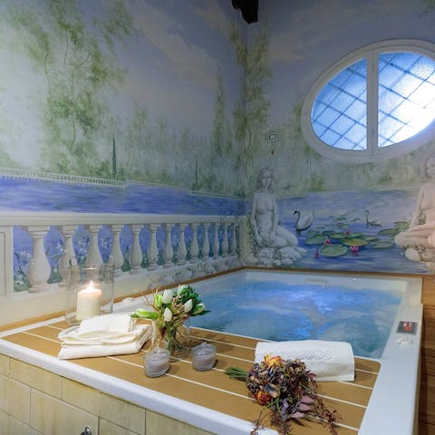 Relax in the hot tub surrounded by striking frescos and Carrara marble from the Michelangelo cave