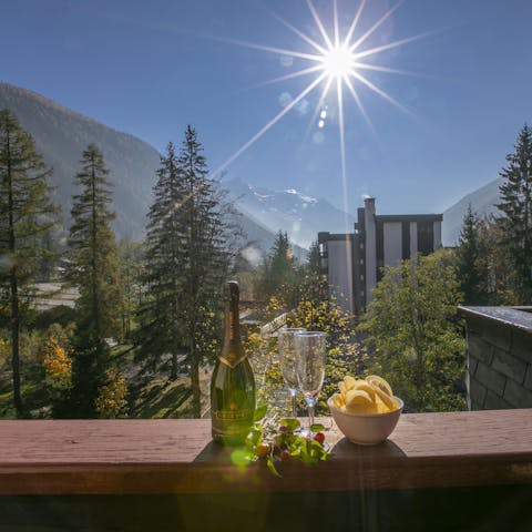 End the evening with a glass of champagne on the balcony, soaking up the mountain scenery