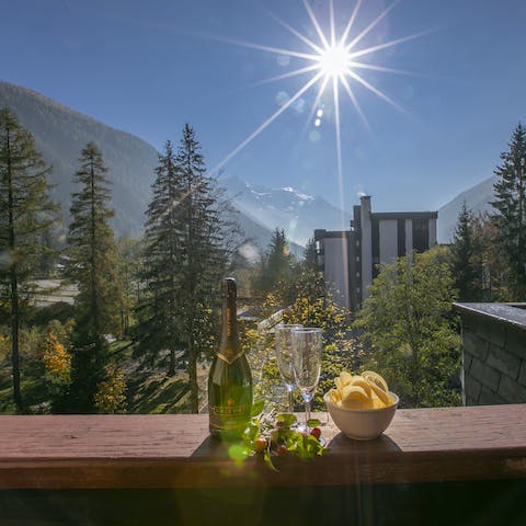 End the evening with a glass of champagne on the balcony, soaking up the mountain scenery