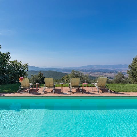 Enjoy  views of the Tuscan Hills while relaxing by the pool
