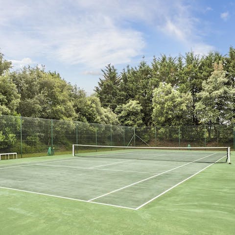 Show off your service game on the estate's private tennis court