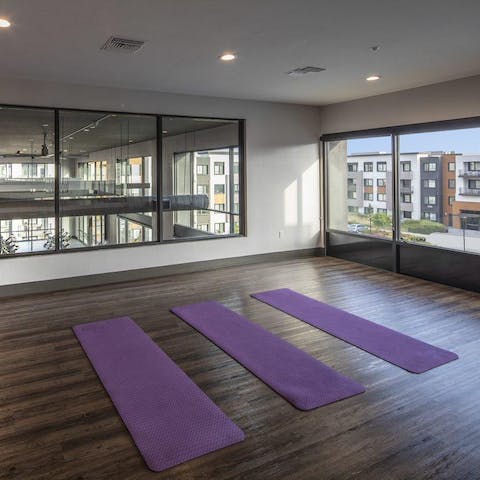 Start the day in mountain pose in the gym's yoga studio