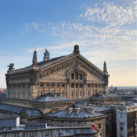 Take a guided tour of the opulent Palais Garnier, a short bus ride away