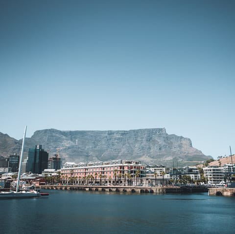 Stroll around the vibrant V&A Waterfront, a five-minute drive away