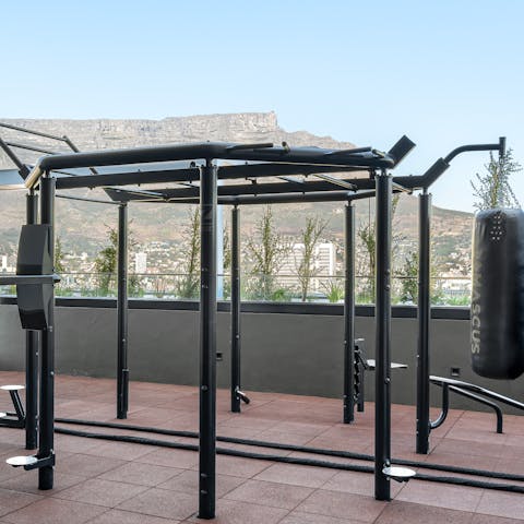Work up a sweat in the shared outdoor gym in the shadow of Table Mountain 