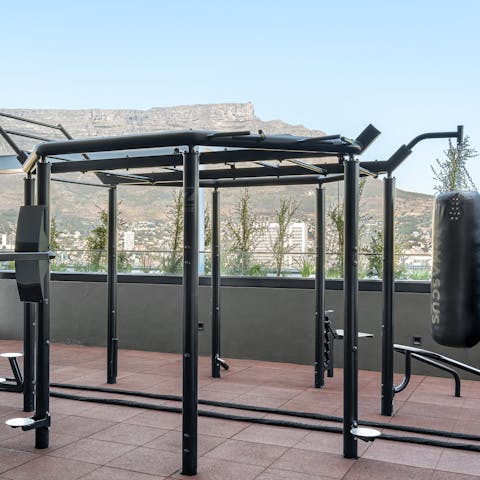 Work up a sweat in the shared outdoor gym in the shadow of Table Mountain