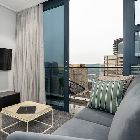 Step out onto your private balcony for cityscape views over your morning coffee