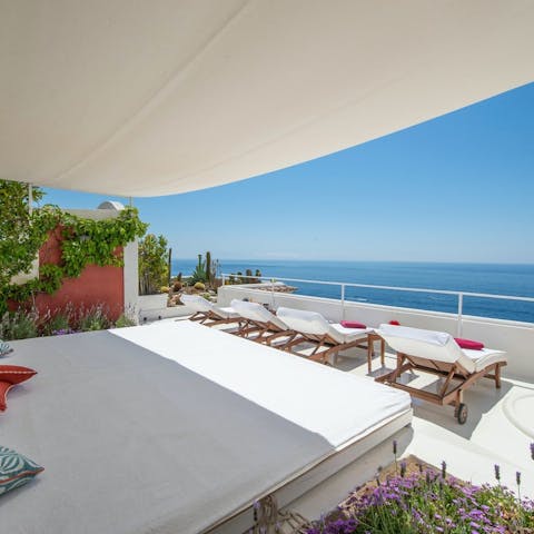 Soak up stunning sea views from the terrace day beds 